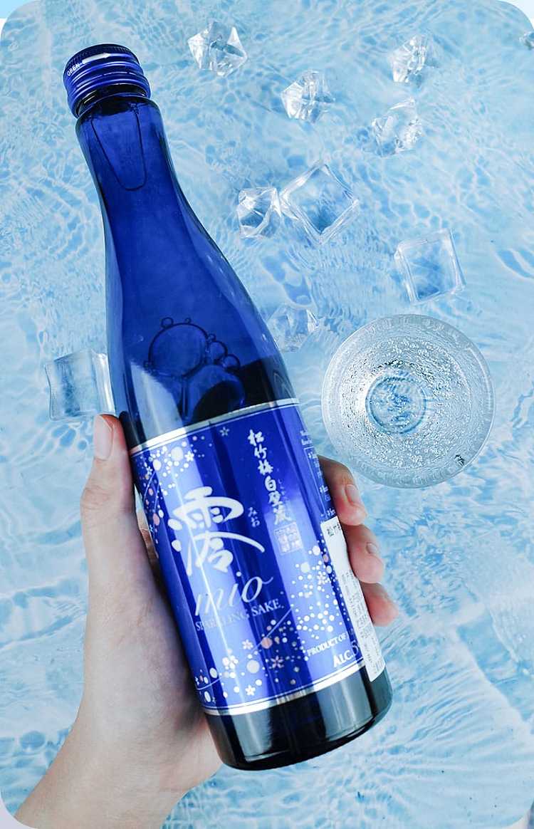pine-bamboo-and-plum-tree-themed-white-walled-storehouse-with-bottles-of-sparkling-sake-alcohol-content-of-5-300ml-4