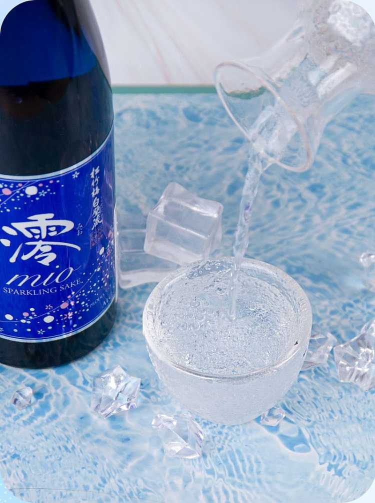 pine-bamboo-and-plum-tree-themed-white-walled-storehouse-with-bottles-of-sparkling-sake-alcohol-content-of-5-300ml-7